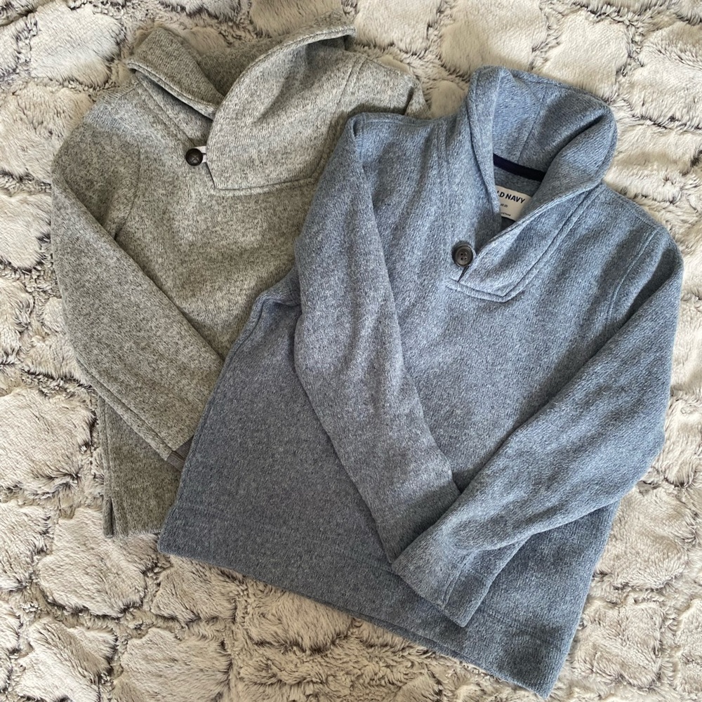 Two sweaters. Both size 5t. One light blue and other is grey